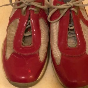 Men’s red sneakers.